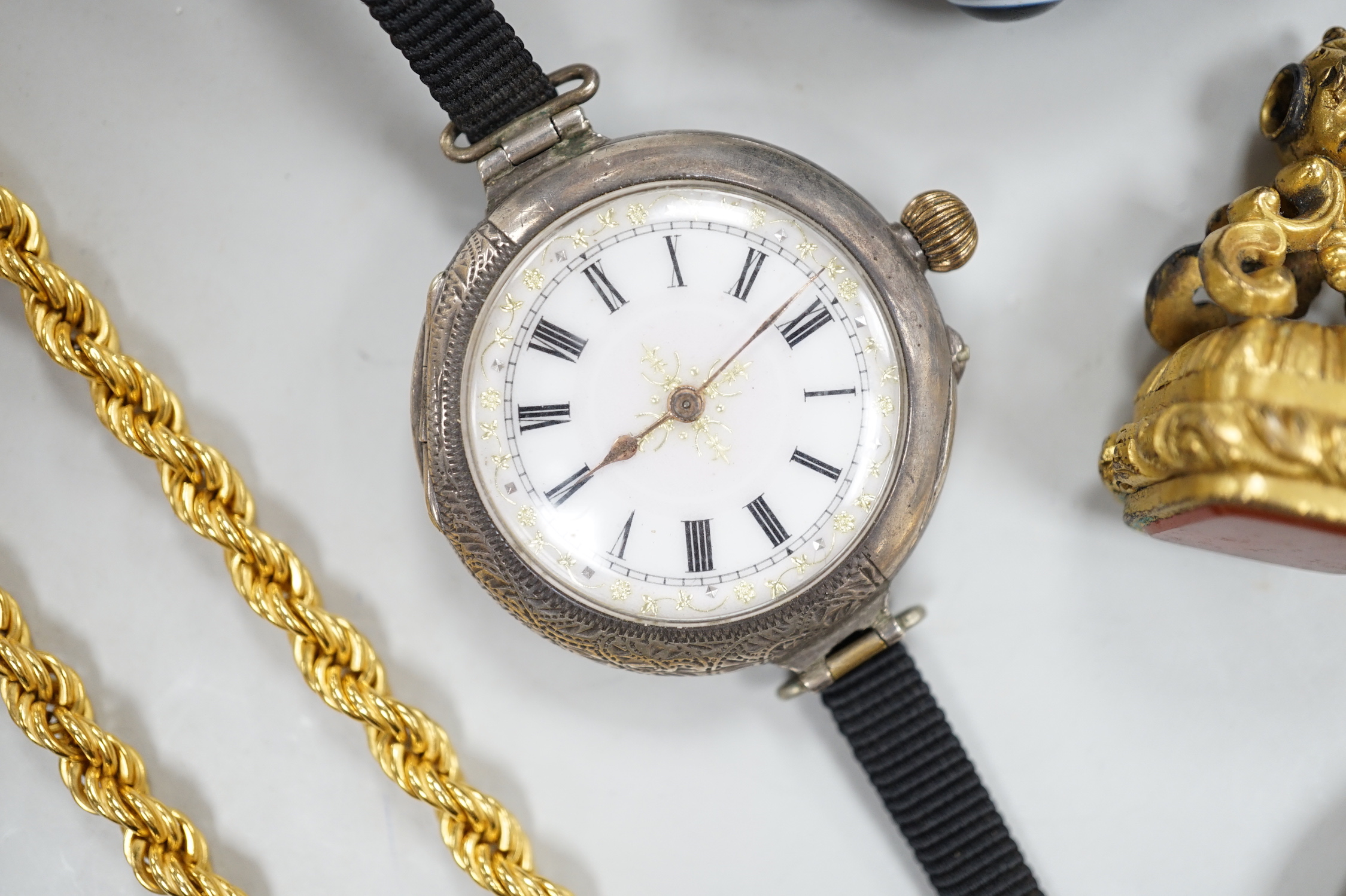 A modern 9ct gold rope twist chain, 39.5cm, 7.8 grams, two 14k fob watches, one with enamelled chapter ring, a silver wrist watch, agate brooch and a gilt metal fob seal.